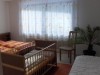 Schlafzimmer mit Kinderbett u. Liege FeWo 66 qm