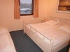 1 Schlafzimmer oben mit TV Bett 200(100+100)x 200